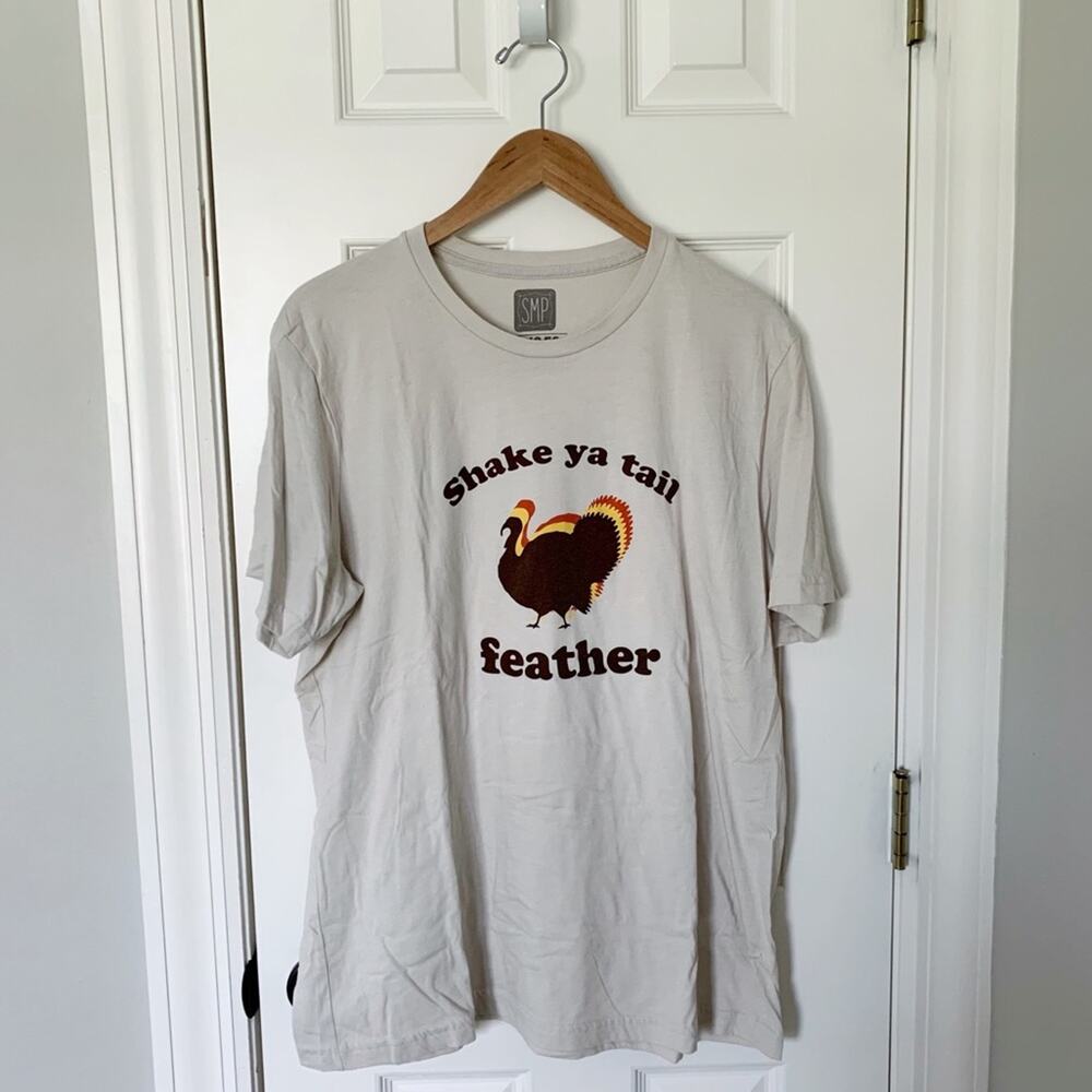 Shake Ya Tail Feather Adult Unisex Tan Tee, size XL